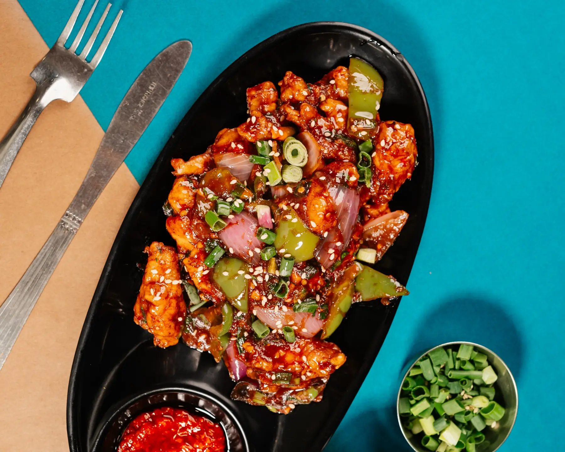 Chilli chicken with peppers and spring onion