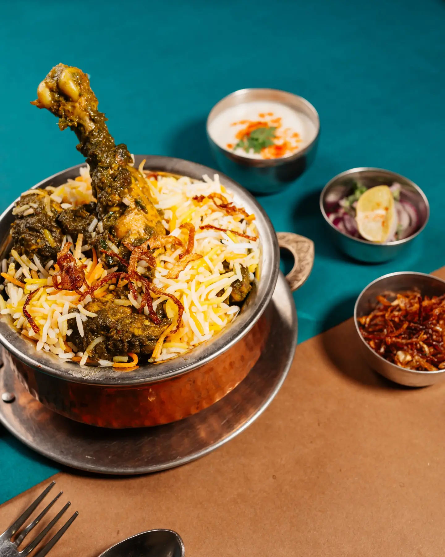 Chicken biryani in a copper handi